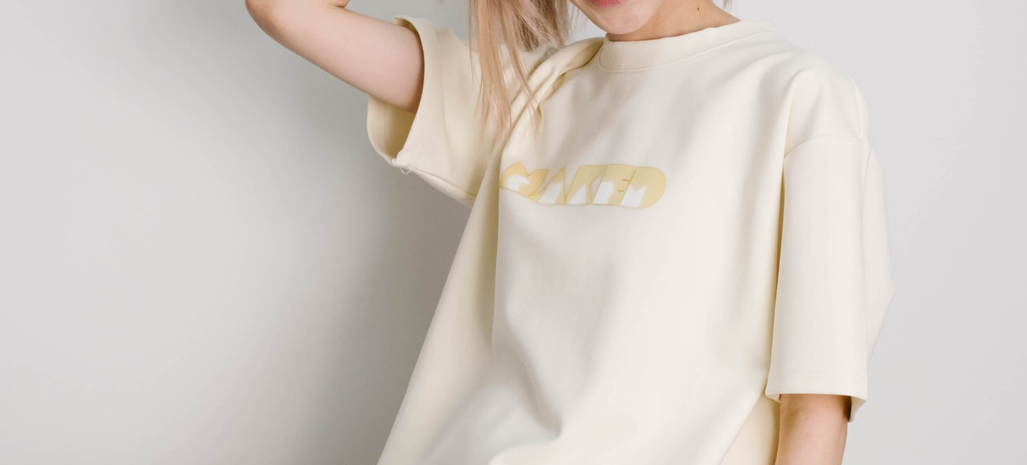 Naked Charm Oversized Signature Glow T-Shirt