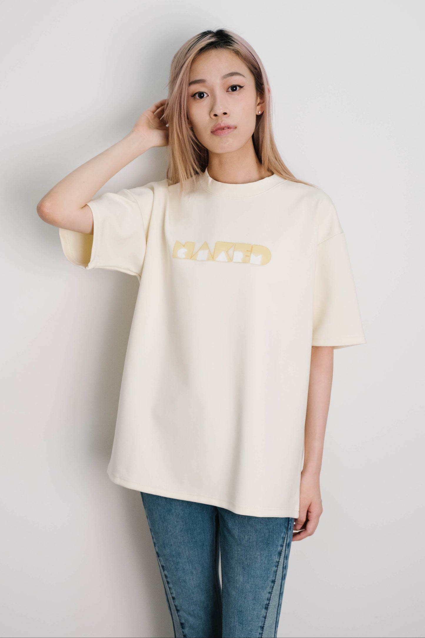 Naked Charm Oversized Signature Glow T-Shirt