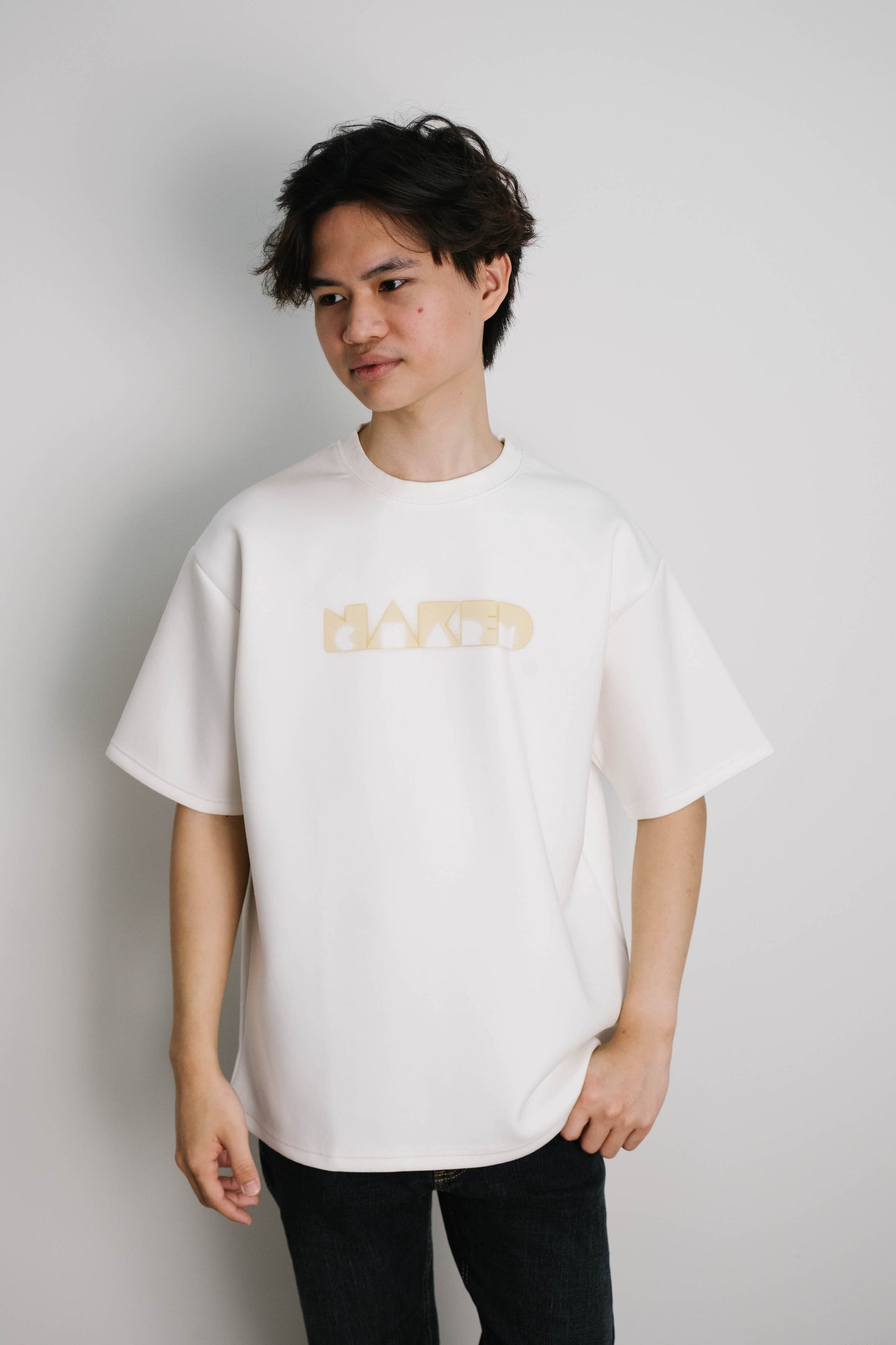 Naked Charm Oversized Signature Glow T-Shirt